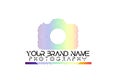 Rainbow camera logo on white background.