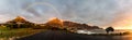 Rainbow at Camps Bay and the Twelve Apostel Mountain at Cape Town