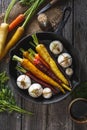 Rainbow Carrots and Spring Onions with Balsamic and Honey Marinade ready to Roast Royalty Free Stock Photo