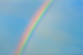 Rainbow in clear blue sky Royalty Free Stock Photo