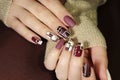 Fashionable matte glossy nail art. Royalty Free Stock Photo