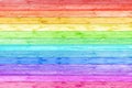 Rainbow color pattern wooden background. LGBT colors. Old rustic wooden wall table floor texture Royalty Free Stock Photo