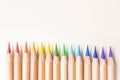 Rainbow color pencils arranged in a row. Royalty Free Stock Photo