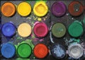 rainbow color watercolor paints palette on black Royalty Free Stock Photo