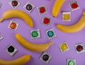 Rainbow of colored condoms on background. Royalty Free Stock Photo