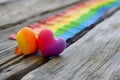 rainbow-colored hearts, to convey a message of love and unity for the entire spectrum of identities