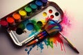 a rainbow-colored paint palette, with a selection of brushes and rollers.
