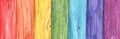 Rainbow colored painted on old wood background. Royalty Free Stock Photo