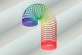 Rainbow colored plastic Slinky