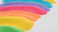 rainbow colored sand stripes colors like blue,red,green,orange,yellow,purple,pink,violet on white background Royalty Free Stock Photo