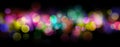 Rainbow colored shiny defocused abstract light bokeh background