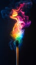 Burning match with rainbow colored smoke and glitter on dark background Royalty Free Stock Photo