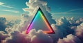 A rainbow colored triangle is in the middle of a cloud filled sky. Royalty Free Stock Photo