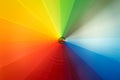 Rainbow colored umbrella in motion Royalty Free Stock Photo