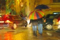 Rainbow colored umbrella under rain Royalty Free Stock Photo