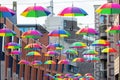 Rainbow colored umbrellas at a line in Nijmegen, Netherlands