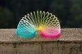Rainbow colored wire spiral toy. Royalty Free Stock Photo