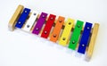 Rainbow Colored Wooden Toy Xylophone on white background Royalty Free Stock Photo