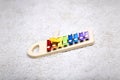 Rainbow colored wooden toy xylophone Royalty Free Stock Photo