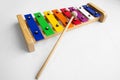 Rainbow Colored Wooden Toy Xylophone on white background Royalty Free Stock Photo