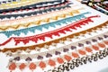 Rainbow of colorful beaded necklaces and bracelets Royalty Free Stock Photo