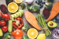 Rainbow colors vegetables and berries background, top view. Detox, vegan food, ingredients for juice and salad
