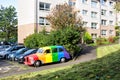 Rainbow coloured car parked in residential area of Glasgow