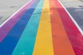 Rainbow coloured crosswalk for Pride Month on Church street in Toronto