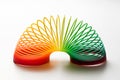 Rainbow coloured slinky toy