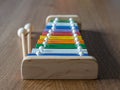 Rainbow coloured xylophone on wooden background angle view. meta Royalty Free Stock Photo