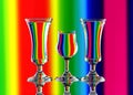 Rainbow colours through water in drink glasses showing refraction.