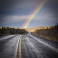 Rainbow country road dark Yukon nature landscape
