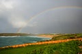 Rainbow Crantock bay North Cornwall England UK near Newquay Royalty Free Stock Photo