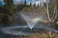 A rainbow created by a water fountain.