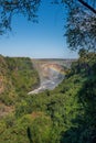 Rainbow crossing gorge under Victoria Falls Bridge Royalty Free Stock Photo