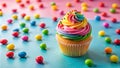 Rainbow cupcake with colorful candy on pastel background. Generative AI Royalty Free Stock Photo