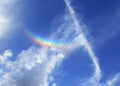 Rainbow in blue sky with clouds Royalty Free Stock Photo