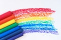 A rainbow drawn with red, orange, yellow, green, blue, indigo, and purple crayons. Royalty Free Stock Photo