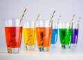 Rainbow drinks. Glass of cocktail. Pride rainbow colors juice straw. Rainbow flag, symbol gays and lesbians LGBT, LGBTQ Royalty Free Stock Photo