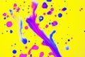 Rainbow drops and streaks of blue and pink paint on a yellow background. Art image. Abstraction