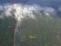 Rainbow and Storm Clouds over Boreal Forest in Kispiox Valley, Northern British Columbia, Canada Royalty Free Stock Photo