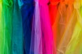 Rainbow fabric background with interesting colors and textures