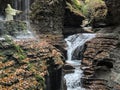 rainbow falls at watkins glen state park (waterfall in a gorge with stone bridge, staircase Royalty Free Stock Photo