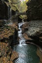 rainbow falls at watkins glen state park (waterfall in a gorge with stone bridge, staircase, rock formation) Royalty Free Stock Photo