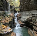 rainbow falls at watkins glen state park (waterfall in a gorge with stone bridge, staircase, rock formation) Royalty Free Stock Photo