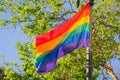 Rainbow flag blowing in the wind, LGBTQ pride month, San Francisco, California Royalty Free Stock Photo