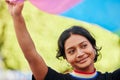 Rainbow, flag and gay pride with an indian woman in celebration of lgbt equality, inclusion or freedom. Community Royalty Free Stock Photo