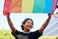 Rainbow, flag and lgbt with an indian woman in the city in celebration of human rights, equality or freedom. Community Royalty Free Stock Photo