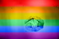 Rainbow flag, lips imprint on LGB background. Homosexual lesbian couple, pride parade symbol, transgender and bisexual