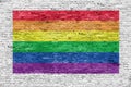 Rainbow flag painted over brick wall Royalty Free Stock Photo